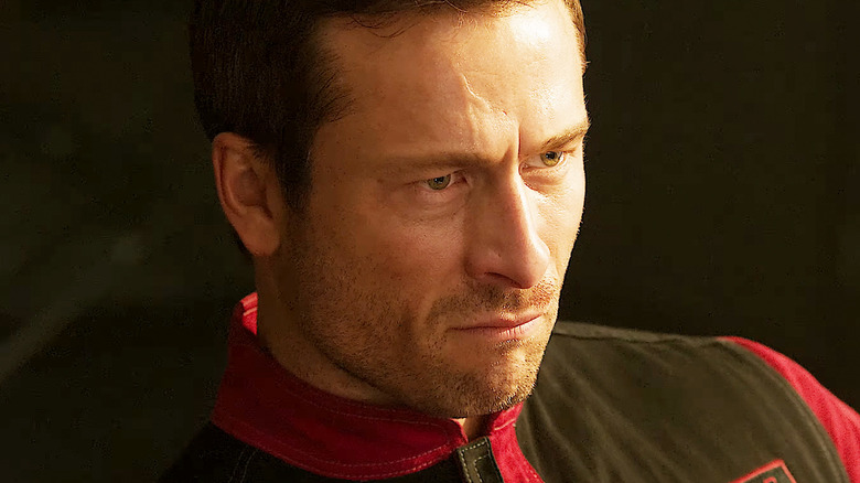 Glen Powell's Ben Richards is seen in a top down closeup in The Running Man