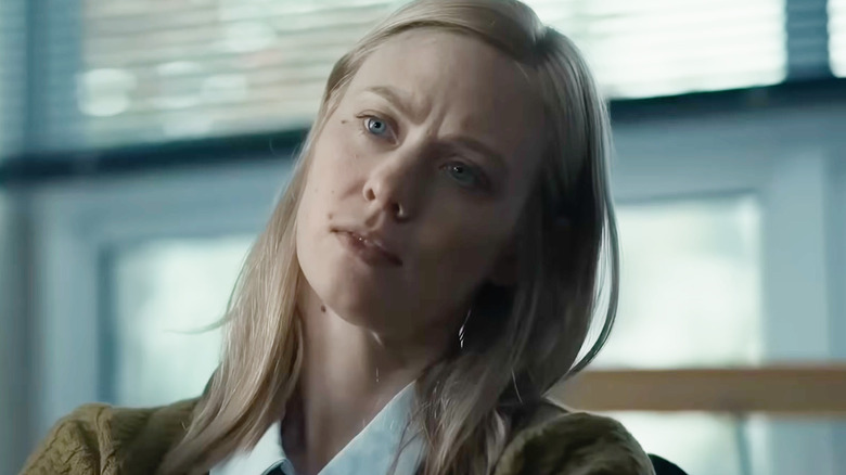 Deborah Ann Woll as Meg tilting her head as she listens to someone talk in The Cycle