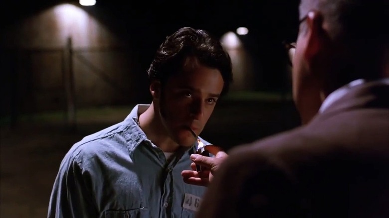 Tommy talks to the warden