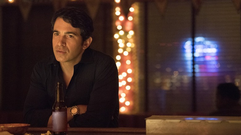 Man at bar with beer