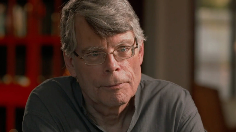 Stephen King listening intently on Finding Your Roots