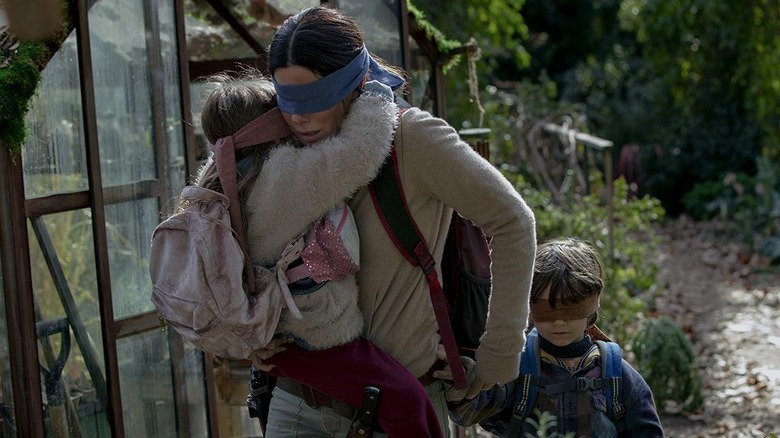 Malorie Hayes holding her children in Bird Box