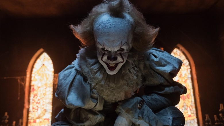 Pennywise boasting a scary smile in IT Chapter One