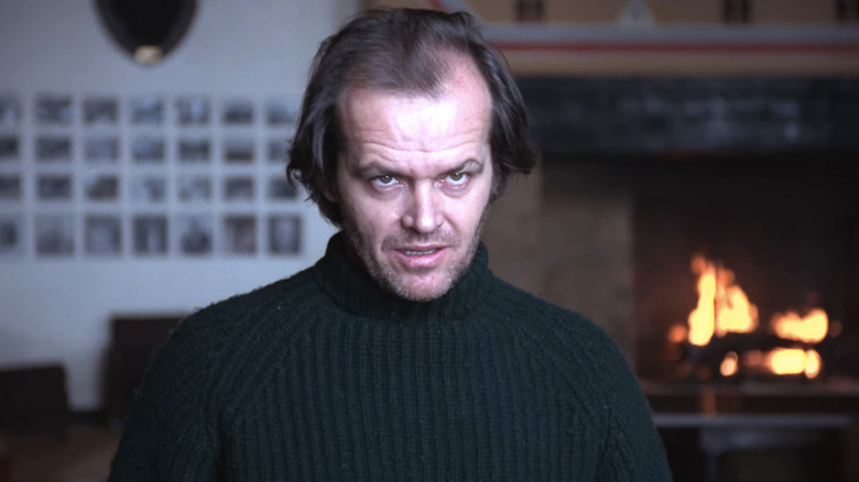 Jack Nicholson's Jack Torrance stares off into the distance in The Shining