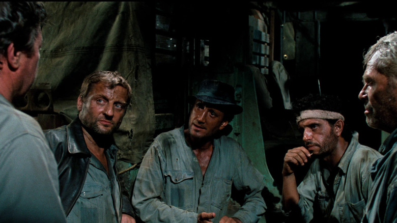 The shady protagonists of Sorcerer discuss a very dangerous job