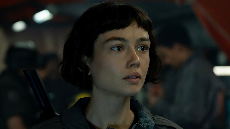 Sydney Chandler as Wendy staring thoughtfully in Alien: Earth