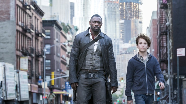 Idris Elba's Roland Deschain and Tom Taylor's Jake Chambers walking in The Dark Tower