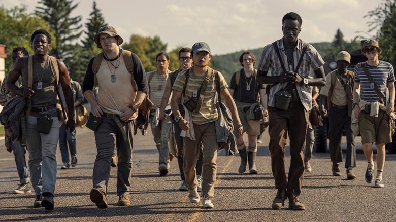 A wide shot of the young participants hiking for their lives in The Long Walk