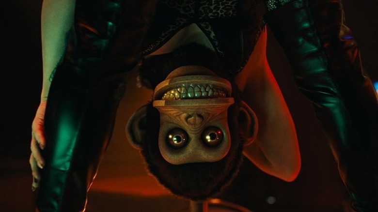 The monkey dances in the sequence of the dream in the monkey