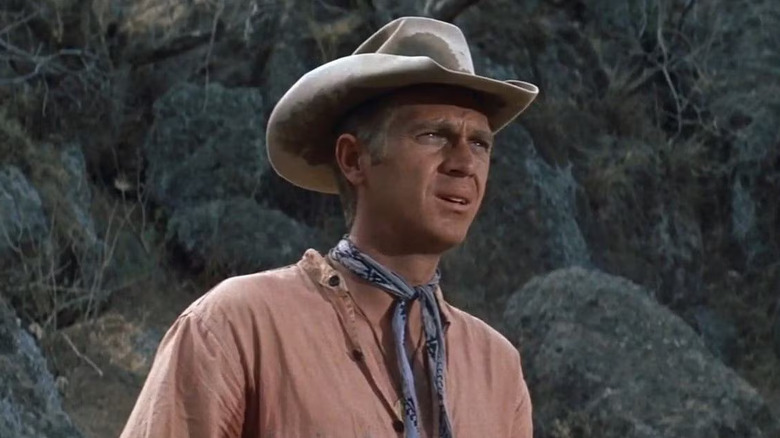 Steve McQueen as Vin, awaiting trouble in The Magnificent Seven