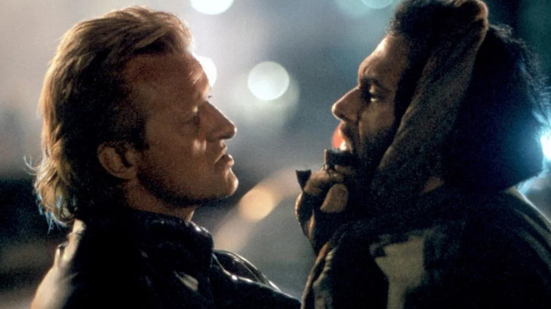 Nick Randall (Rutger Hauer) grabbing Malak Al-Rahim