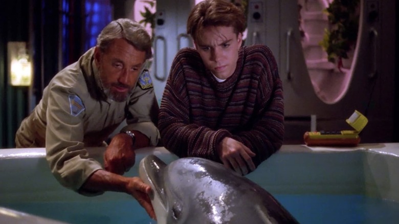 Captain Bridger and Lucas talking to Darwin the dolphin on seaQuest DSV