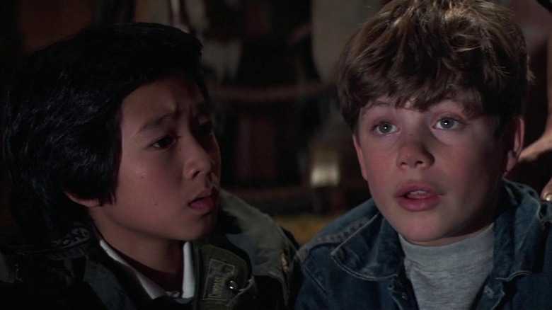 Ke Huy Quan as Data and Sean Astin as Mikey looking amazed in The Goonies