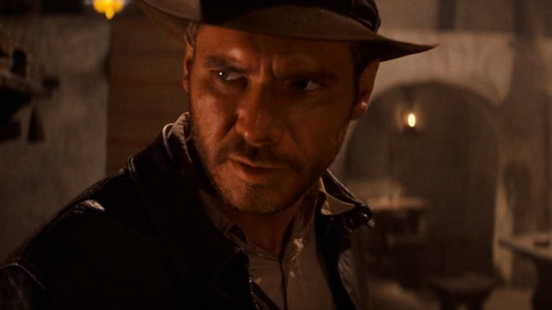 Harrison Ford in the role of Indiana Jones appears to be interested in the invaders of the lost astronomy