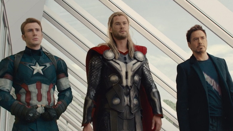Captain America (Chris Evans), Thor (Chris Hemsworth), and Tony Stark (Robert Downey Junior) together 