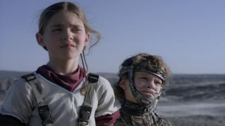 True and Uly standing together on Earth 2