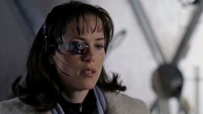 Devon Adair wearing special equipment on her face in Earth 2