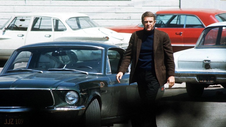 Bullitt walking through parking lot