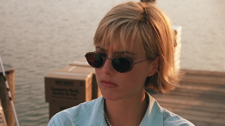 Jenny frowning while wearing sunglasses in Deep Impact
