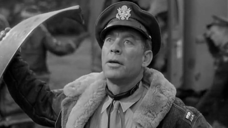 Ward Bond as Al Yackey looking upward in A Guy Named Joe
