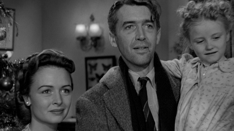 George Billy Holdinah is a girl, next to his wife in a wonderful life.