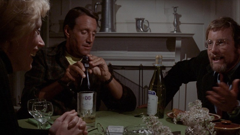 Ellen, Martin, and Haber sitting at a jaw dinner table