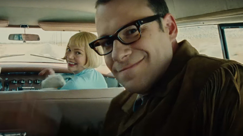 Uncle Bennie and Mitzi look back and smile in The Fabelmans
