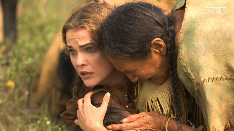 Naomi Wheeler lying on the ground in 