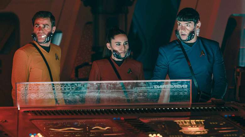 James Kirk, La'an Noonien-Singh, and Spock wearing transparent masks in Star Trek: Strange New Worlds