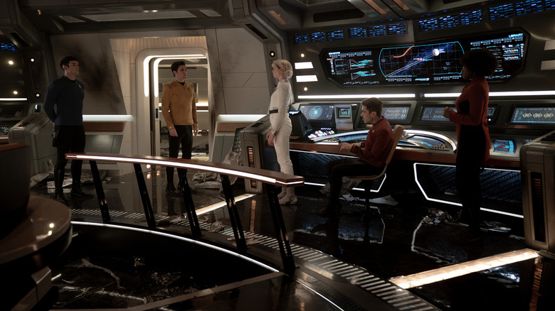 Ethan Beck in the role of Spok, Paul Wesley in the role of James T Kirk, Jess Bush in the role of a church nurse, Martin Quinn in the role of Scotti, and Celia sponsored Taibah with Ohurra with a hot discussion on a heroic bridge in new strange worlds
