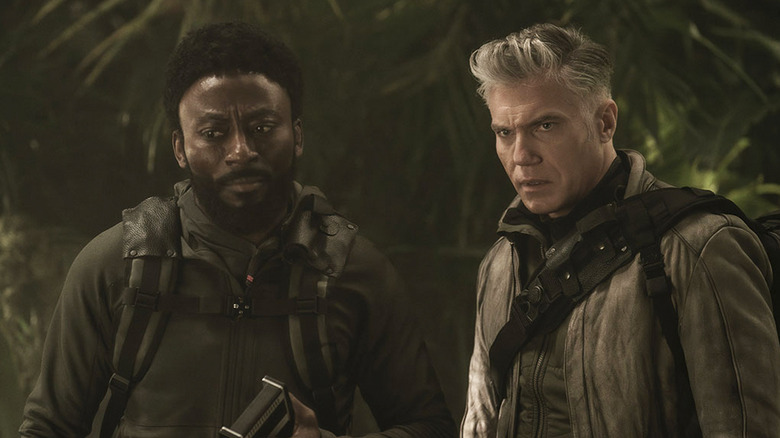 Anson Mount's Christopher Pike and Babs Olusanmokun's Joseph M'Benga looking concerned on Star Trek: Strange New Worlds