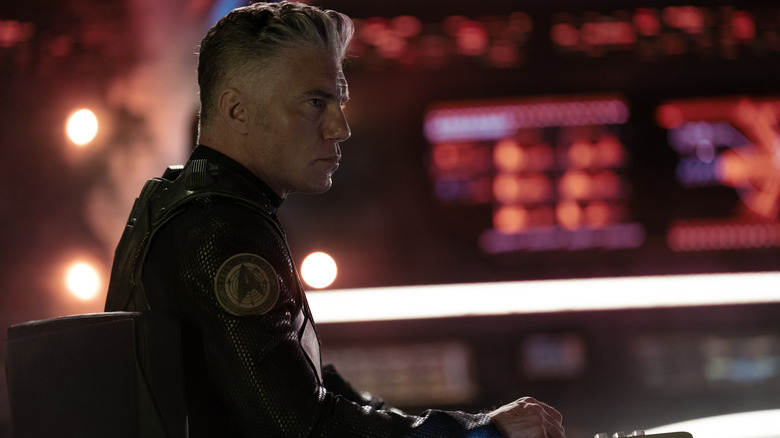 Anson Mount as Captain Christopher Pike on the bridge of the USS Enterprise in Strange New Worlds