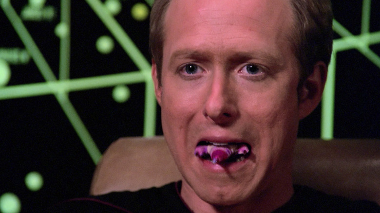 Lt. Cmdr. Dexter Remmick with a parasitic alien in his mouth in Star Trek: The Next Generation