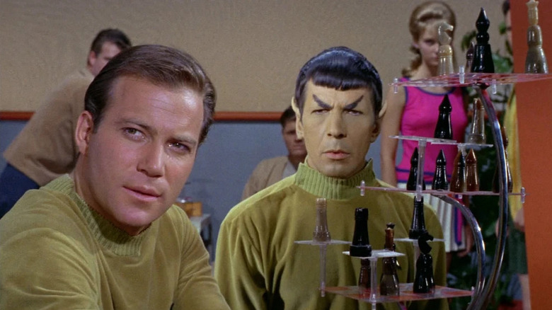 Star Trek "Where No Man Has Gone Before" Kirk (William Shatner) and Spock (Leonard Nimoy) sitting at table near their chess game