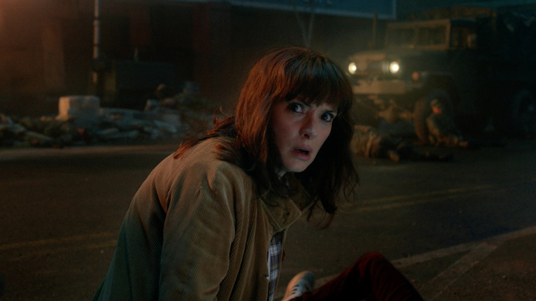 Joyce Byers (Winona Ryder) looks up in shock in Stranger Things