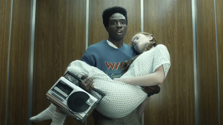 Stranger Things, Lucas holding Max in an elevator