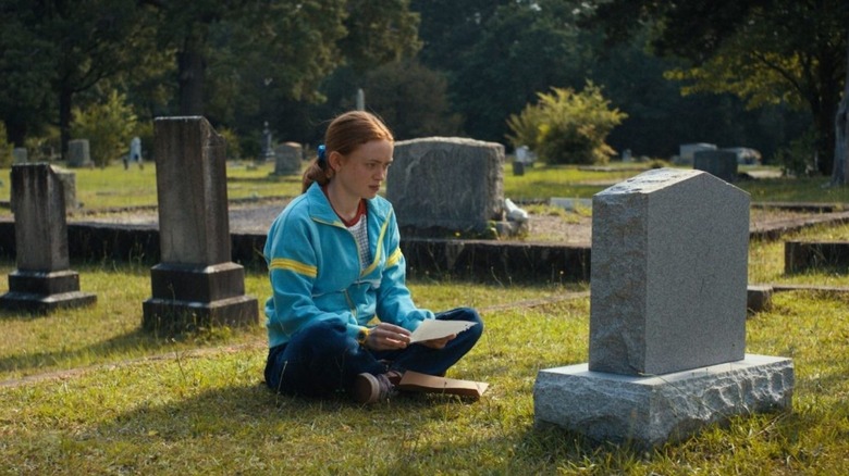Max visits Billy's grave in Max levitates over Billy's grave in Stranger Things Season 4