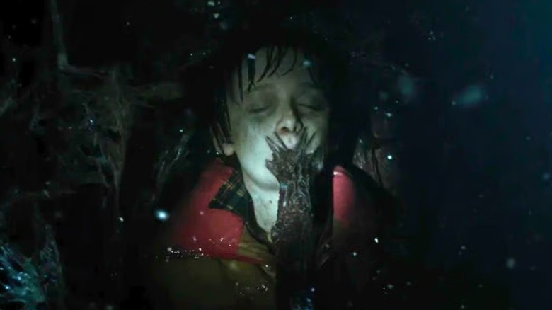 Will Byers trapped inside a tree on "Stranger Things"