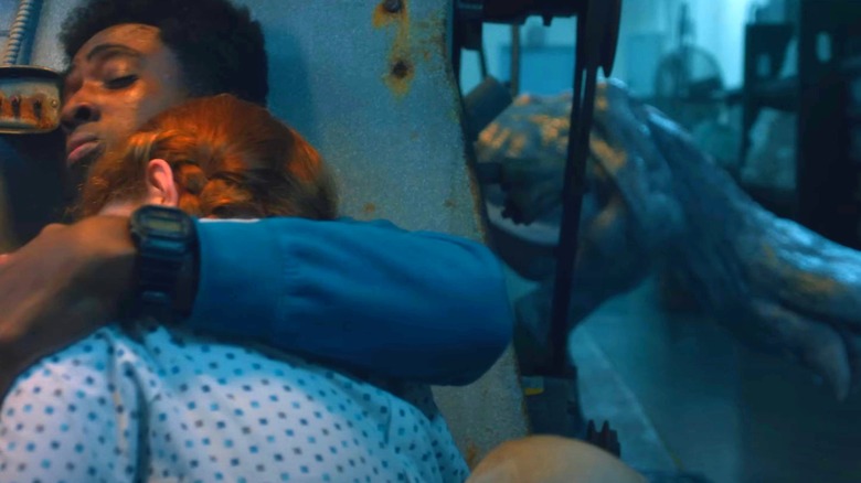 Lucas hides from a Demodog in Stranger Things