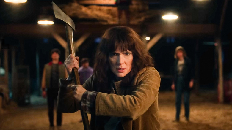 Winona Ryder's Joyce Byers wields an axe in Stranger Things 5
