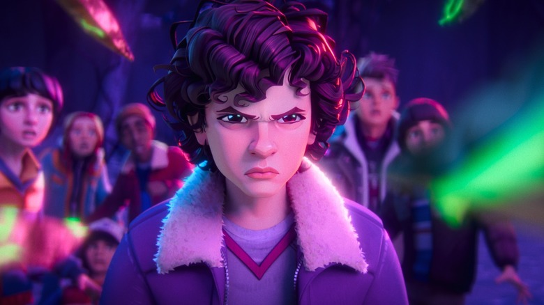 Eleven looks angry while her friends look on in horror in Stranger Things: Tales From '85