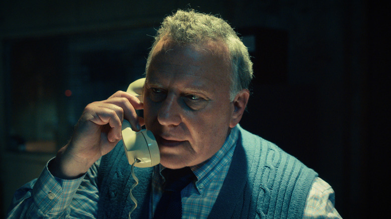 Paul Reiser as Dr. Owens talking on the phone in Stranger Things
