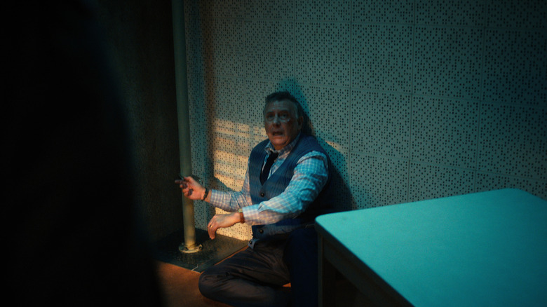 Paul Reiser as Dr. Owens chained to a pipe in Stranger Things