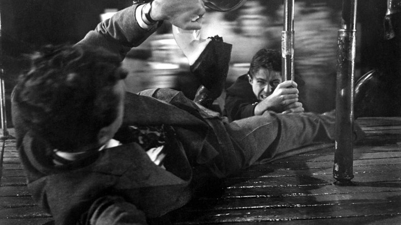 Robert Walker and Farley Granger fight to the death in Strangers on a Train (1951)