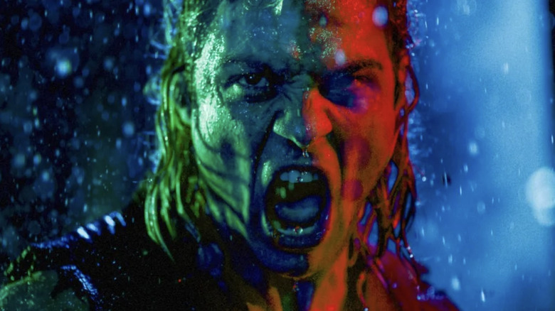 Ken Masters is colorfully angry in the rain in Street Fighter