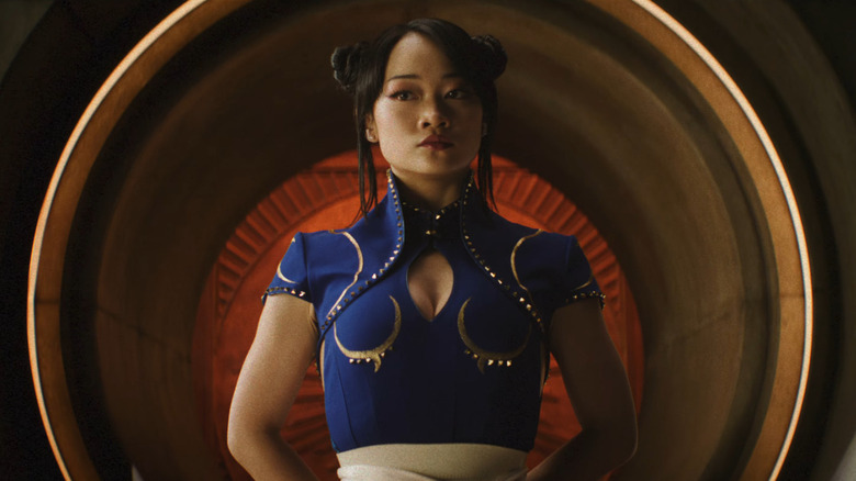 Callina Liang as Chun-Li with her hands behind her back in Street Fighter (2026)