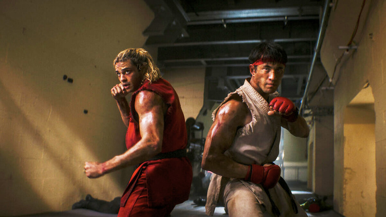 Ken and Ryu stand back to back, ready to fight their foes in Street Fighter