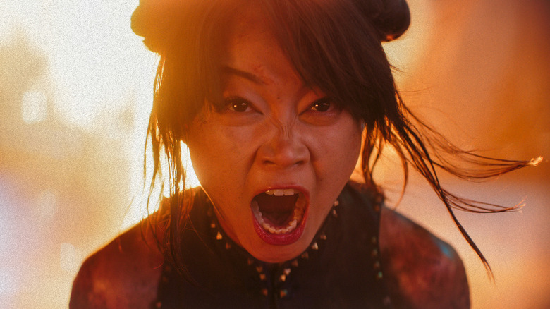 Chun-Li yelling surrounded by fire in Street Fighter