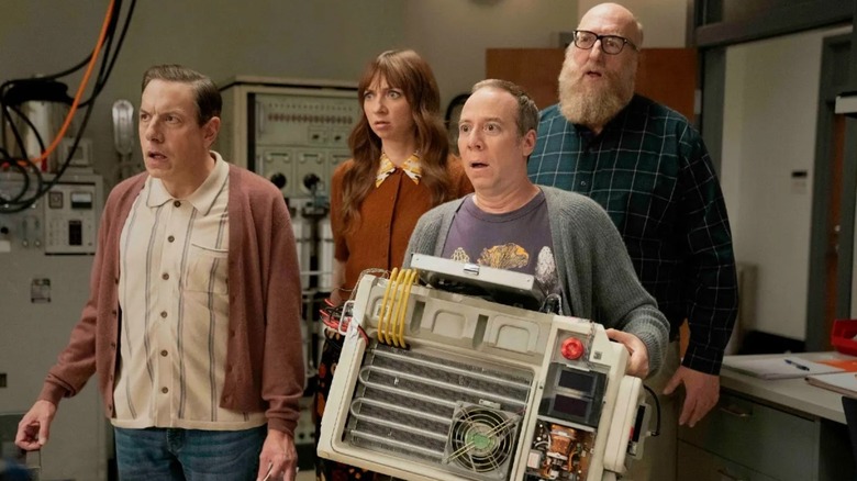 Barry Denise Stuart holding a machine and Bert all looking confused on Stuart Fails to Save the Universe