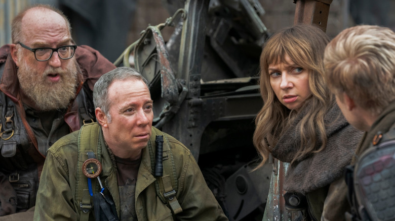 Bert Stuart and Denise covered in dirt in an apocalypse in Stuart Fails to Save the Universe